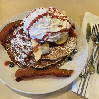 Early Bird Restaurant - Bradburn - Buttermilk pancake stack with fresh fruit and cream, and bacon. - Breakfast & Brunch Near Me - Westminster, Colorado