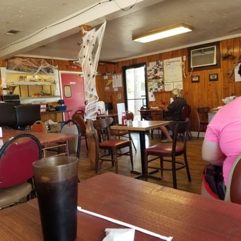 Our Daily Bread - a woman sitting at a table in a restaurant - Desserts Near Me - Eddy, Texas