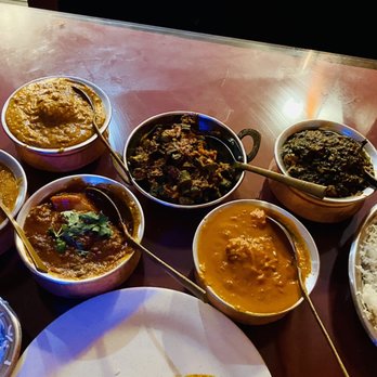 Dinner India - The lineup. Pick your level of HOT. We went with traditional Indian spice Woo! Go for it! XOXO - Indian Near Me - Pensacola, Florida
