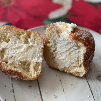 Aveiro Bakery - a half eaten pastry on a plate - Coffee & Tea Near Me - Oakville, Ontario
