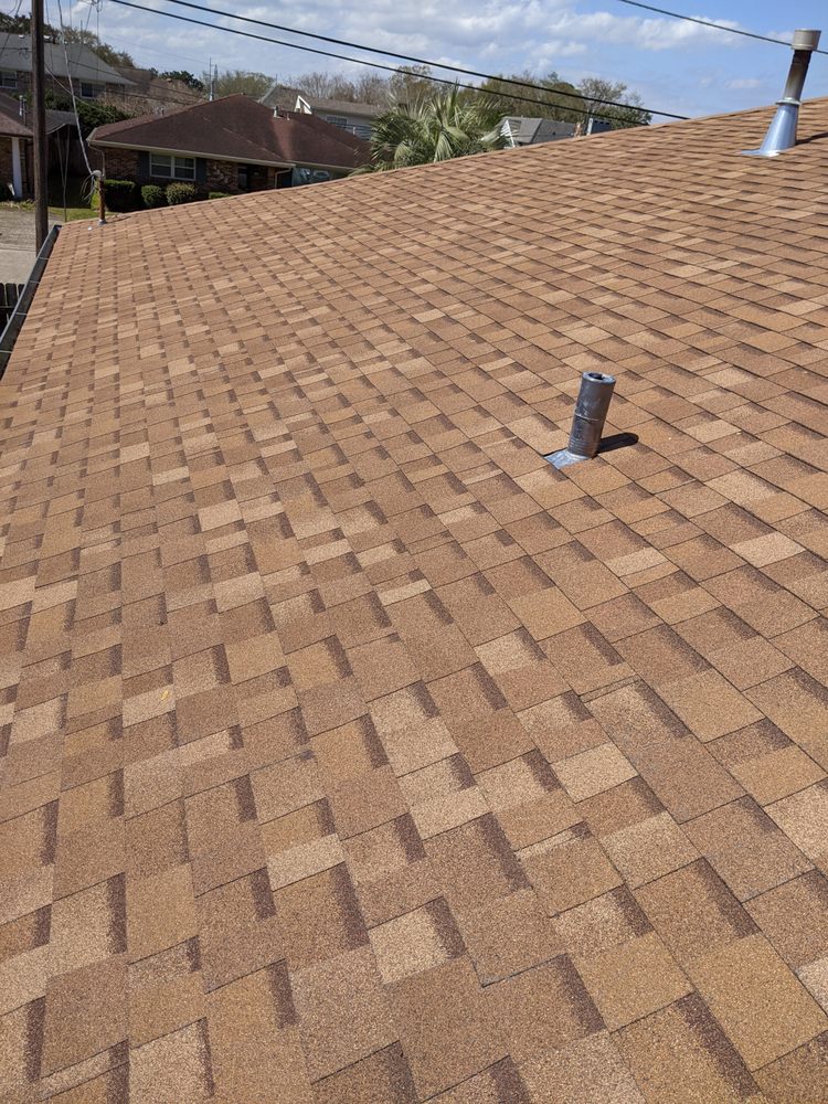 Slide of Above Standard Roofing