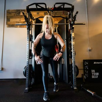 Superset Fitness - A Superset Fitness client practicing a standing cable chest press. - Gyms Near Me - Denver, Colorado Superset Fitness - A Superset Fitness client practicing a standing cable chest press. - Gyms Near Me - Denver, Colorado