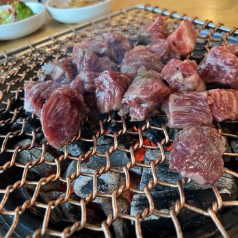 Korean Grill - Boneless short rib being cooked - Korean Near Me - East Northport, New York Korean Grill - Boneless short rib being cooked - Korean Near Me - East Northport, New York