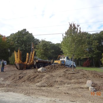 Debest - a bulldozer and a bulldozer on a construction site - Landscaping Near Me - South Haven, Michigan
