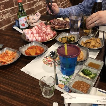 K-BBQ - Thinly sliced pork, marinated beef, kimchi, daikon radish, marinated jalapeños and onions, marinated fish, sauces, marinated bean sprouts - Korean Near Me - Palatine, Illinois K-BBQ - Thinly sliced pork, marinated beef, kimchi, daikon radish, marinated jalapeños and onions, marinated fish, sauces, marinated bean sprouts - Korean Near Me - Palatine, Illinois