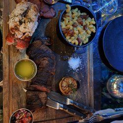 Freddy’s Chophouse - The perfect meal - lobster tail, steak, Mac n cheese.