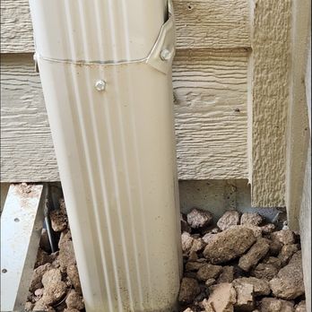 C & D Seamless Gutters - Poor job strapping downspout to house - Gutter Services Near Me - Portage, Wisconsin C & D Seamless Gutters - Poor job strapping downspout to house - Gutter Services Near Me - Portage, Wisconsin