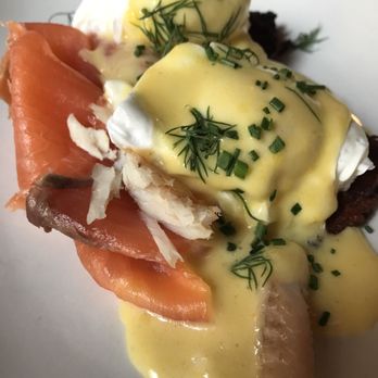 Left Bank - Salmon with poached eggs on potato latkes - New American Near Me - New York, New York Left Bank - Salmon with poached eggs on potato latkes - New American Near Me - New York, New York