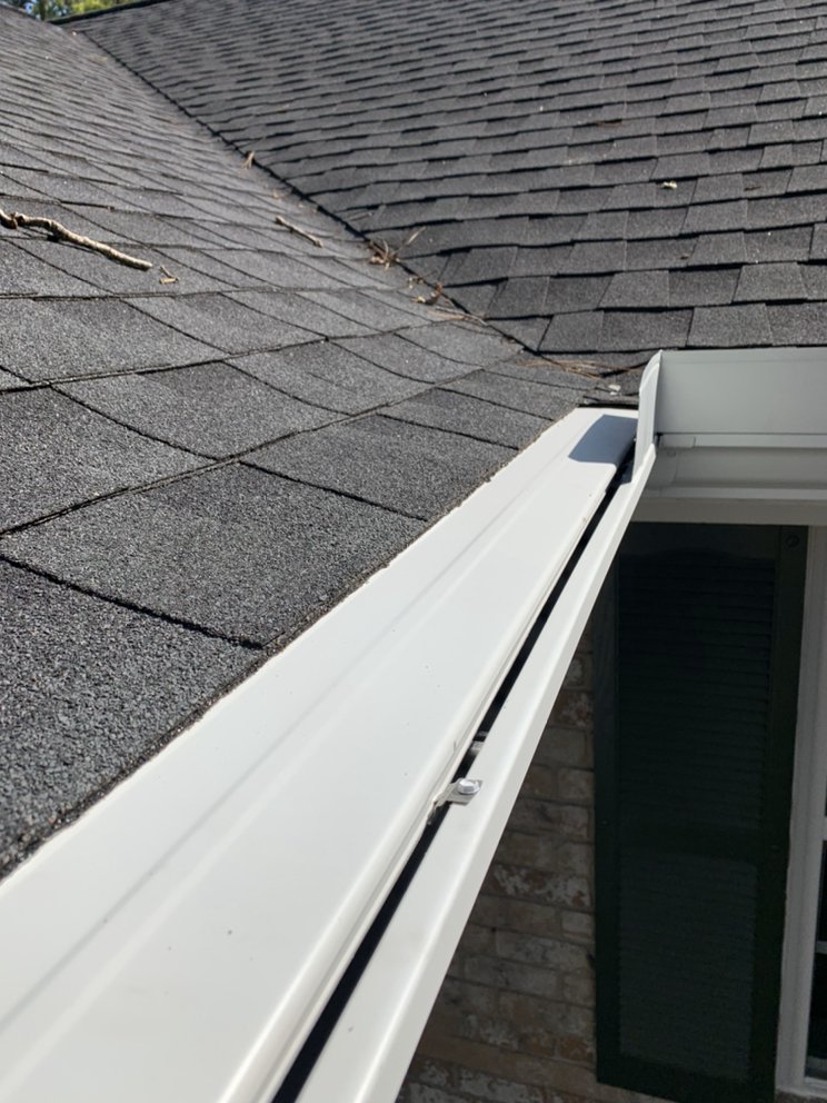 Slide of NL Strong Gutter & Roofing