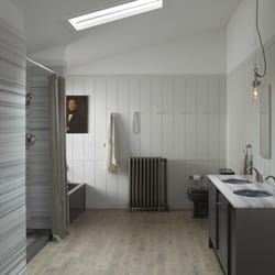 Gerhard's Kitchen Bath & Lighting Store - There is an unmistakable sense of serenity and balance when a room feels like a single, focused expression.
