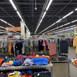 Bellingham Goodwill - Part of the summery displays at the front of the store, with men's clothing section behind.
