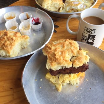 Biscuit Head - Full breakfast in the back & maple sirracha sausage/egg/cheese biscuit with brown sugar cinnamon coffee. Berry bomb is best jam by the way!! - Cafes Near Me - Asheville, North Carolina