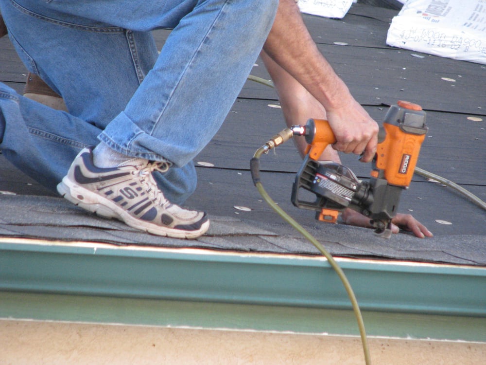 Slide of Tooter's Roofing