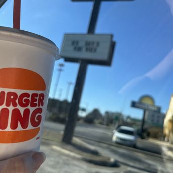 Burger King - a hand holding a cup with a straw - Fast Food Near Me - Fayetteville, North Carolina
