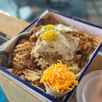 Treylor Park - Chicken & sausage gravy waffle nachos! - New American Near Me - Ponte Vedra, Florida Treylor Park - Chicken & sausage gravy waffle nachos! - New American Near Me - Ponte Vedra, Florida