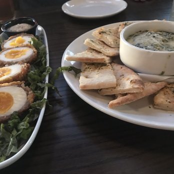 Thirsty Lion - Great starters! Scotch eggs and artichoke dip...the bread is so warms and soft inside with crispy edges...mmmm - American Near Me - Euless, Texas Thirsty Lion - Great starters! Scotch eggs and artichoke dip...the bread is so warms and soft inside with crispy edges...mmmm - American Near Me - Euless, Texas