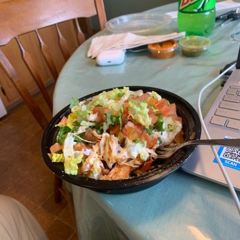 El Pariente Mexican Grill - Spicy chicken bowl. A bit too much sour cream. It does taste good. - Tacos Near Me - White Bear Lake, Minnesota