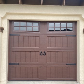 Soderstrom Garage Doors - Small door. Derek was able to salvage our old opener and use it for the small door (which didn't have a remote opener previously) - Garage Door Services Near Me