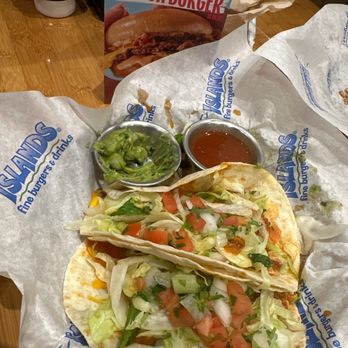 Islands Restaurant - Northshore tacos and image of Smash burger from menu. - Burgers Near Me - San Diego, California