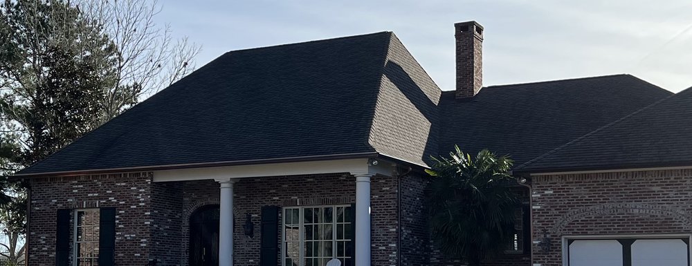 Slide of Pine Belt Gutters