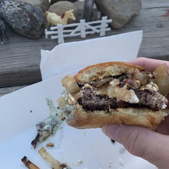 Rachel's Keep On Keepin On Coffee - a hand holding a half eaten sandwich - Food Trucks Near Me - South Fork, Colorado Rachel's Keep On Keepin On Coffee - a hand holding a half eaten sandwich - Food Trucks Near Me - South Fork, Colorado