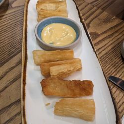 Mil Roast Sports & Bar - Fried yucca....not the full portion, we started eating it as soon as it hit the table