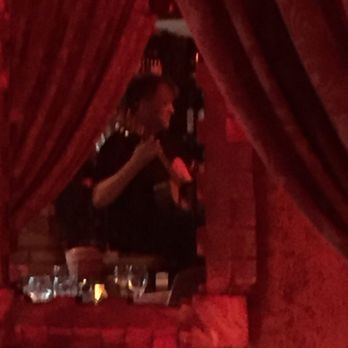 Geja's Cafe - Spanish guitarist. Very relaxing. - Fondue Near Me - Chicago, Illinois