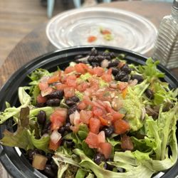 The Squeezed Lemon - Bowl with chicken, beans, corn, veggies and a tiny bit of guacamole salsa and pico and rice. Not a very big bowl.