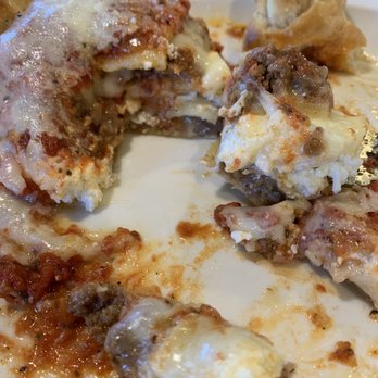 Kinsey's Italian Cafe - In the middle of eating the 1/2 order lasagna. Mostly Italian sausage in the bolognese sauce. Good stuff! - Cafes Near Me - McCordsville, Indiana