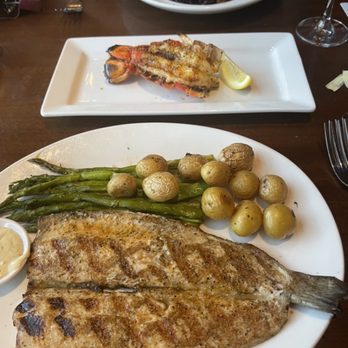 Seasons 52 - Boneless trout, asparagus and potatoes; side of Maine lobster; fire-kissed pork chop - New American Near Me - Raleigh, North Carolina