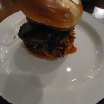 Laurel Lounge - a pulled pork sandwich on a plate - Bars Near Me - Davis, West Virginia