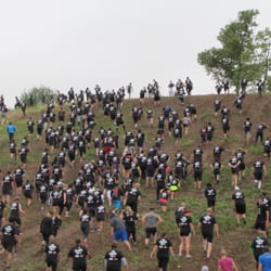 Mylo Obstacle Fitness - 600 Spartans Sprinting up the hill at MYLO Obstacle Fitness