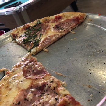 Salvation Pizza - Canadian Bacon pizza (basil on half) was yummy! - Pizza Near Me - Austin, Texas