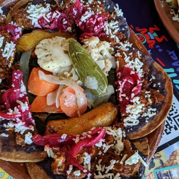 Curra's Grill - Oltorf - Not my usual selection but I went for the nachos with Yucatan style pork cooked in banana leaves with black beans. Fabulous - Mexican Near Me - Austin, Texas Curra's Grill - Oltorf - Not my usual selection but I went for the nachos with Yucatan style pork cooked in banana leaves with black beans. Fabulous - Mexican Near Me - Austin, Texas