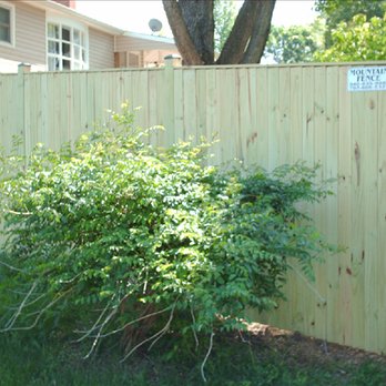 Mountain Fence - Solid Board Fence with Cap - Fences & Gates Near Me Mountain Fence - Solid Board Fence with Cap - Fences & Gates Near Me