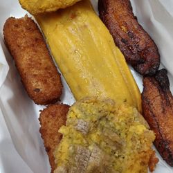 Two Cuban Guy's - Wonderful sides with the Taste of Cuba. Tostones, plantains, ham croquettes, and a tostada.