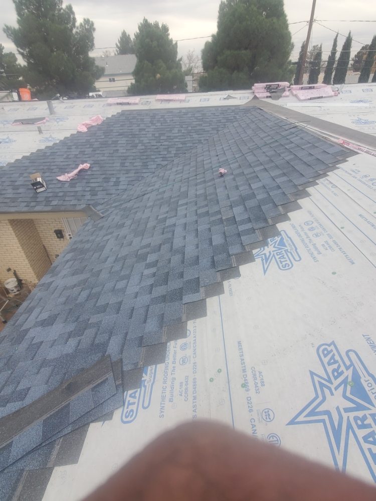 Slide of El Paso Roofing 915