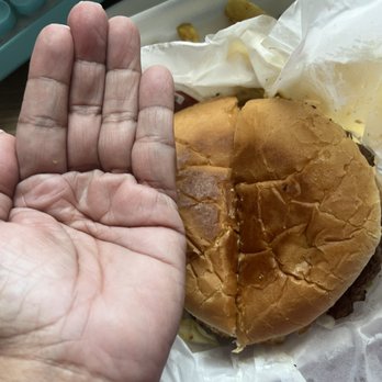 Freddie's - Showing my hand for size reference - Burgers Near Me - Wharton, Texas