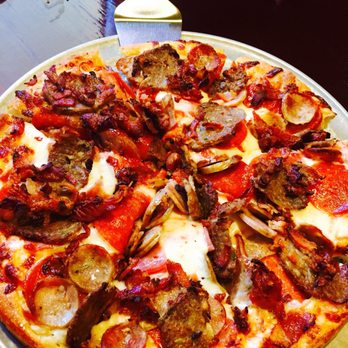 Mystic Pizza - a pizza with pepperoni, sausage, and cheese - Italian Near Me Mystic Pizza - a pizza with pepperoni, sausage, and cheese - Italian Near Me
