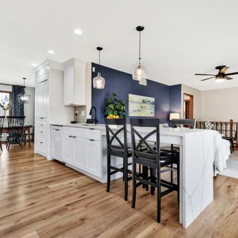Lily Ann Cabinets - Bright kitchen featuring White Shaker Elite cabinets, sleek black pulls, a navy accent wall, and a walk-in pantry. Clean, modern, and airy! - Kitchen & Bath Near Me - Largo, Florida Lily Ann Cabinets - Bright kitchen featuring White Shaker Elite cabinets, sleek black pulls, a navy accent wall, and a walk-in pantry. Clean, modern, and airy! - Kitchen & Bath Near Me - Largo, Florida
