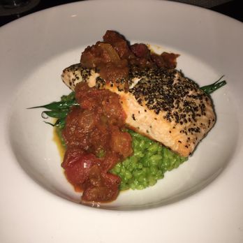 Twist Martini - My salmon was cooked to perfection. It's on a bed of I think spinach risotto. - New American Near Me - Virginia Beach, Virginia