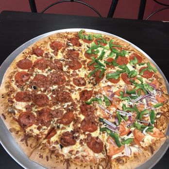 Tito's Pizza - a pepperoni and cheese pizza - Pizza Near Me - New Hamburg, Ontario Tito's Pizza - a pepperoni and cheese pizza - Pizza Near Me - New Hamburg, Ontario
