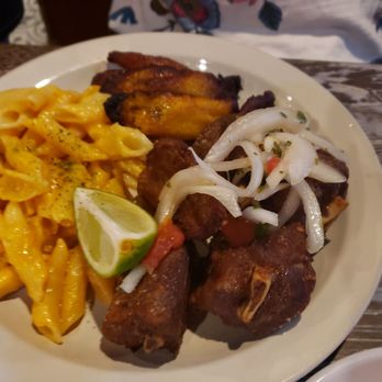 Celias Cuban Cuisine - Pork ribs with Mac and cheese and plantains - Cuban Near Me - Columbia, Maryland Celias Cuban Cuisine - Pork ribs with Mac and cheese and plantains - Cuban Near Me - Columbia, Maryland