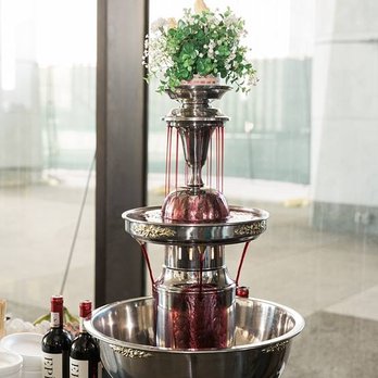 We Do Fondue - Red Wine Tower...perfect next to a giant DARK SWEDISH CHOCOLATE FOUNTAIN! - Caterers Near Me - Albany, New York We Do Fondue - Red Wine Tower...perfect next to a giant DARK SWEDISH CHOCOLATE FOUNTAIN! - Caterers Near Me - Albany, New York