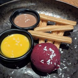 VOUS - Churros with mango & chocolate sauce and raspberry gelato