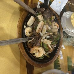 Taqueria Mexico Restaurant - A portion for two people complete rip off I believe the cooker is still in the food