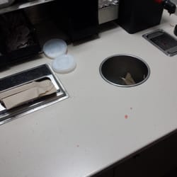 Over Flowing garbage, food covered counter tops and food born scraps everywhere. wouldn't touch this counter with YOUR hands.