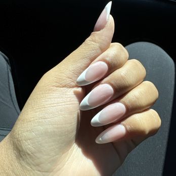 Biotone Nails & Spa - Medium length almond white French tip nails - Nail Salons Near Me - Huntington Beach, California Biotone Nails & Spa - Medium length almond white French tip nails - Nail Salons Near Me - Huntington Beach, California
