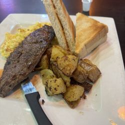 Hampton Bar And Grill - Steak and Eggs. Delicious and filling. Was actually 3 eggs, unlike most places. Great service by Samara.