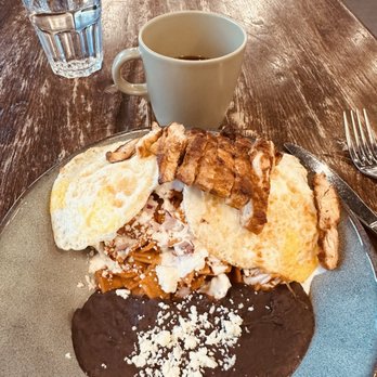 La Finca Coffee & Bakery - Chilaquiles con pollo and eggs! Black beans and cheese! - Bakeries Near Me - Frisco, Texas La Finca Coffee & Bakery - Chilaquiles con pollo and eggs! Black beans and cheese! - Bakeries Near Me - Frisco, Texas
